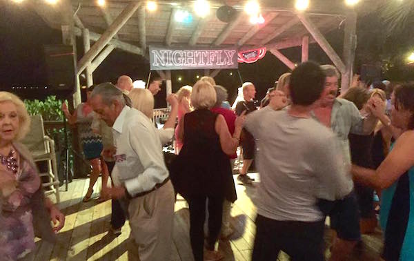 Tiki patrons dancing to Nightly.