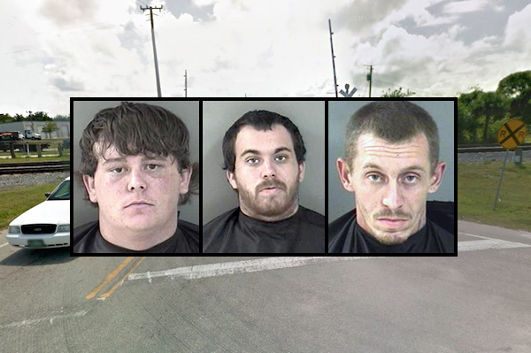Indian River County Sheriff's Office detain three men for riding FEC railroad train.