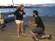 Arch McQuade asks Katie McGlaughlin for her hand in marriage on the pier at the Sebastian Tiki Bar & Grill.