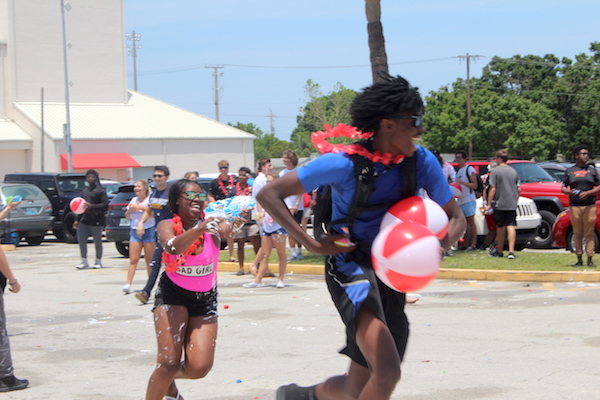 Vero Beach Seniors chase each other with squirt guns.