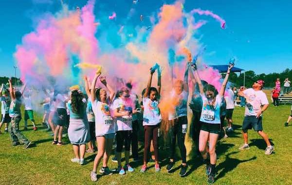 Sebastian River Middle School students participate in its 5k choir color run.