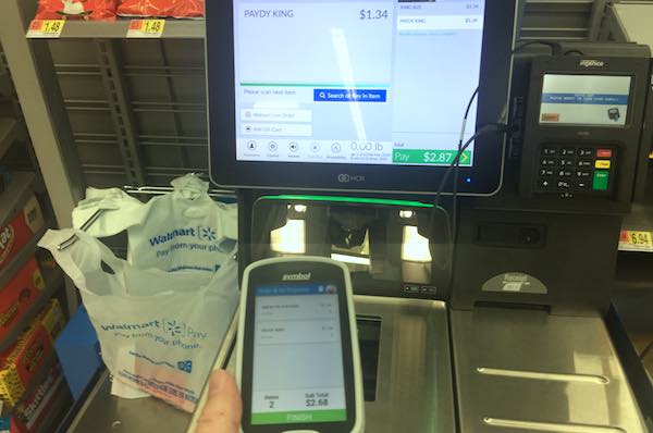 When done shopping, take the Scan & Go to Walmart's Self Checkout and scan the black barcode on the screen. (Photo: Andy Hodges)