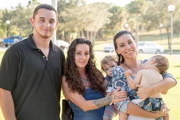 Brandon Gilley poses with his mother, sister, and nephews in a family photo.