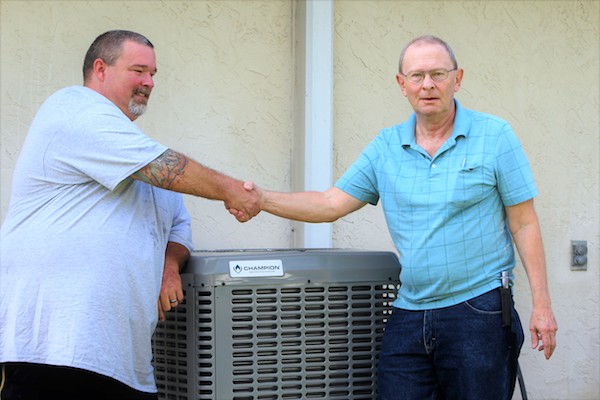 Man receives free air conditioning unit in Sebastian, Florida.