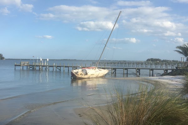 A sailboat has been abandoned since Hurricane Irma in Sebastian, Florida.