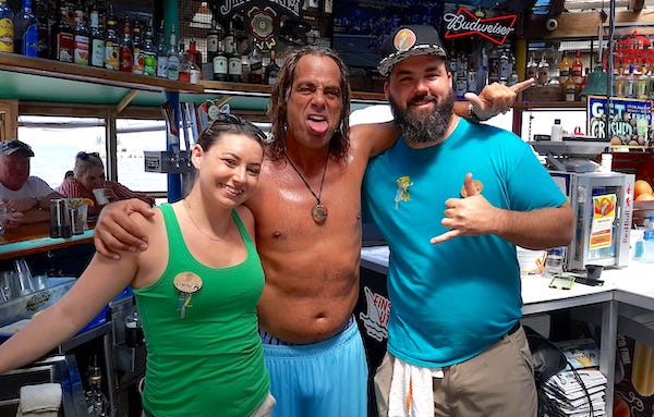 Captain Hirams bartenders Crystal Griffin and Adam Line with Peter Dante.