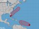 Two tropical disturbances in the Atlantic.