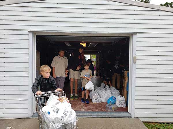 Boy Scouts help in fight against hunger during food drive in Sebastian, Florida. 
