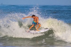 Anthony Osment riding waves at the Sebastian Inlet. (Photo by: Danielle Redden)