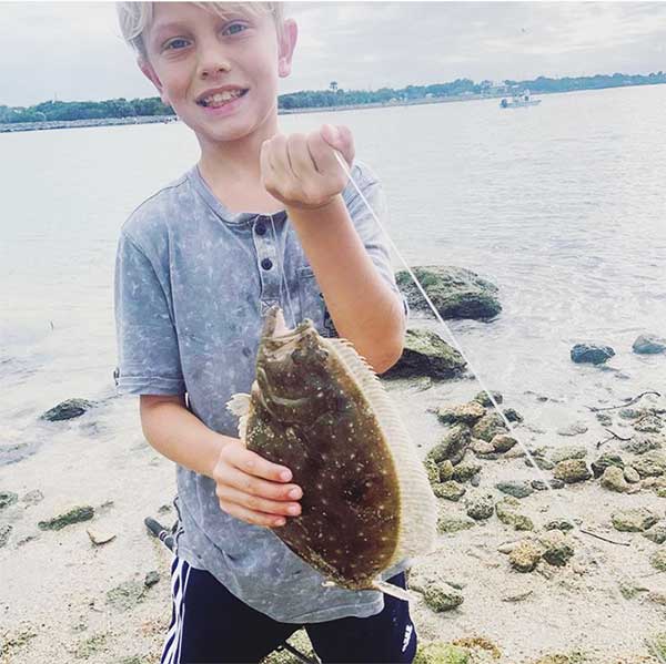 Landon Nelson caught a flounder.