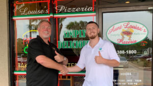 Dave Siperek (left) for Aunt Louise's Pizzeria and Andrew Morrison (right) for Blue River Delivery.