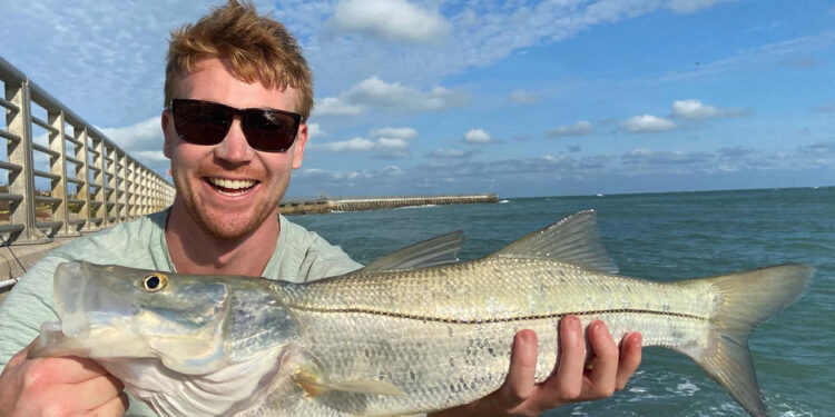 Andrew Knight with a Snook at the Sebastian Inlet