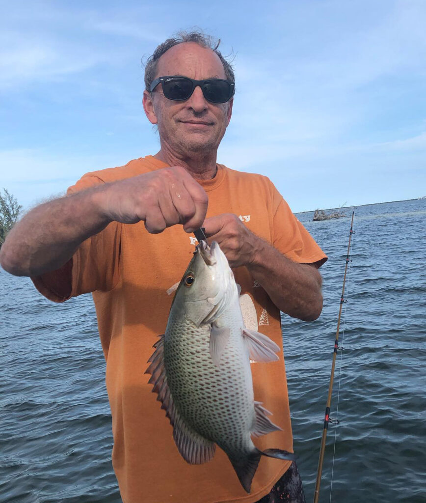Dave Belson with a Snapper at Spoil Island 8 in Sebastian.