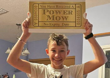 Hank Miller receives a Power Mow card.