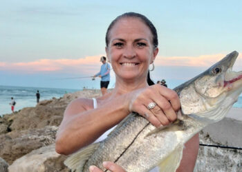 Angie Clifford with a snook at the Sebastian Inlet.