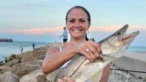 Angie Clifford with a snook at the Sebastian Inlet.