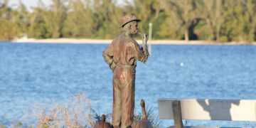 A statue of Paul Kroegel, a significant figure who established Pelican Island as a bird sanctuary in Sebastian, Florida.