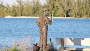 A statue of Paul Kroegel, a significant figure who established Pelican Island as a bird sanctuary in Sebastian, Florida.