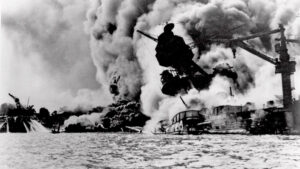 The infamous Japanese attack on Pearl Harbor, Hawaii, is shown in this Dec. 7, 1941 file photo. The USS Arizona is pictured in flames after being hit. (Credit: AP)