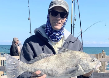 Kirby Kitchener with a black drum at the Sebastian Inlet