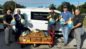 Team Success Enterprises Inc. and the Indian River County Sheriff's Office partnered to deliver Thanksgiving meals