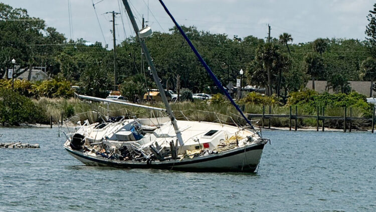 Abandoned sailboat following a storm.