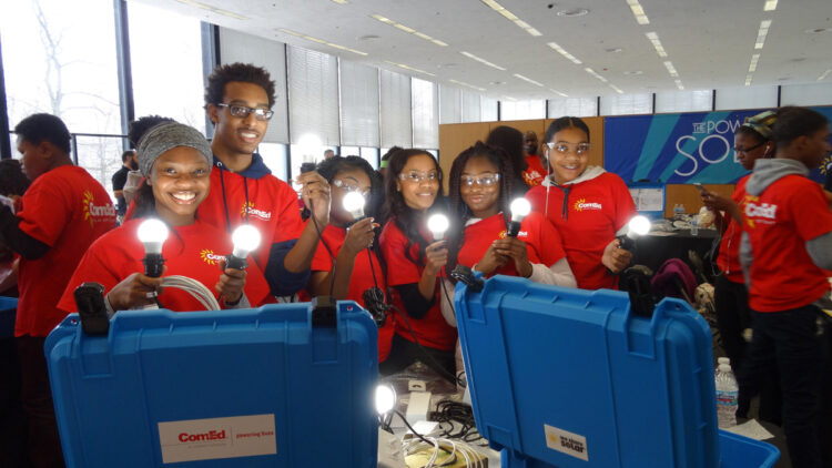 Solar power kits assembled by local teens that will be used for classrooms in rural Kenya