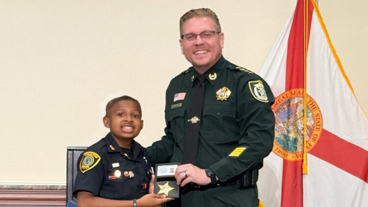 DJ Daniel was sworn in as an honorary deputy by Indian River County Sheriff Eric Flowers.
