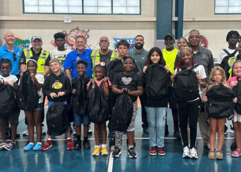 Indian River County Commissioner Joe Flescher, along with staff from the Indian River County Solid Waste Disposal District, WM, and the Gifford Youth Achievement Center, shared smiles and excitement with campers as they received their brand-new backpacks filled with school supplies.