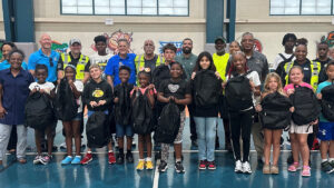 Indian River County Commissioner Joe Flescher, along with staff from the Indian River County Solid Waste Disposal District, WM, and the Gifford Youth Achievement Center, shared smiles and excitement with campers as they received their brand-new backpacks filled with school supplies.