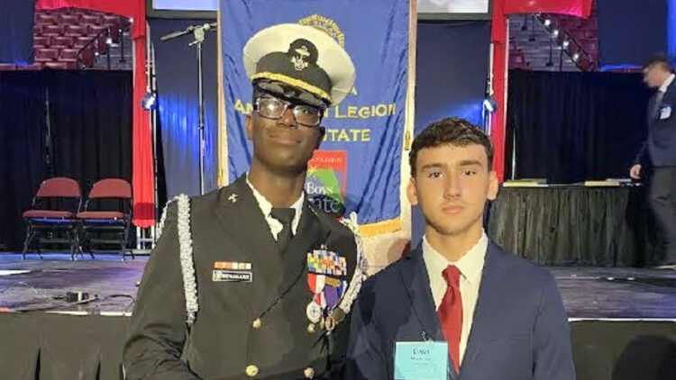 Mike Beaucejour (left) and Davi Moraes (right) post for photos in the Tucker Center, where the majority of the program activities were located.