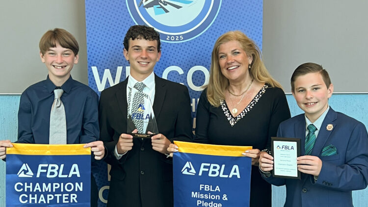 Pictured are SCJH students Trentan Geeraerts, Dylan Porazzo, and Thomas Hand, along with FBLA Advisor, Ms. Michelle Funnell.