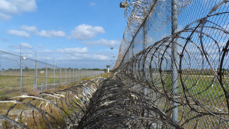 A federal appeals court expedited a legal battle over a controversial Alligator Alcatraz center, but a ruling is unlikely before early 2026.