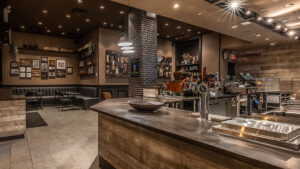 Starbucks announces closures of undisclosed North American stores and 900 non-retail job cuts.