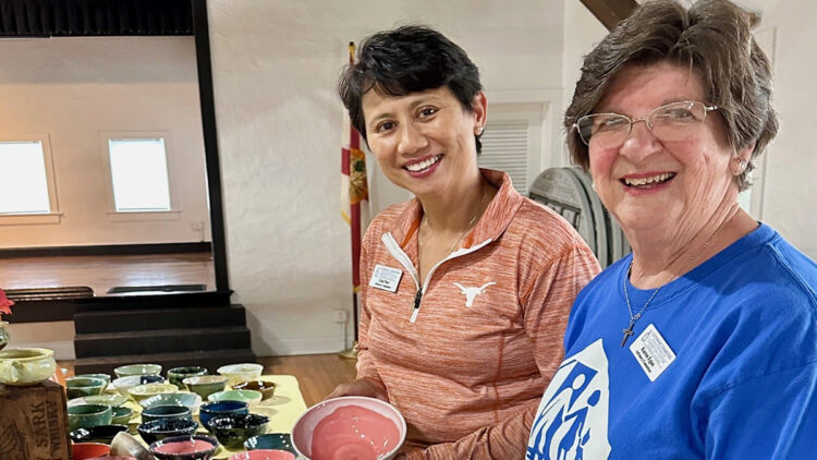 Samaritan Center volunteers: Lisa Parr (left) and Karen Egan (right) show off one-of-a-kind Soup Bowl pottery made by potters at Indian River Clay to help homeless families.