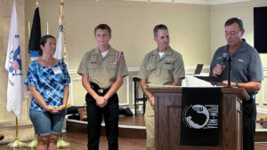 From left to right: Mrs. Elizabeth Ward, Cadet Kyle Ward, CDR (ret) Peter Bissonnette, and Lt. Col. (ret) Jay Torres reading the Cadet of the Month citation. (Photo: Kim Palazzolo, MOAA)