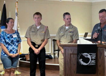 From left to right: Mrs. Elizabeth Ward, Cadet Kyle Ward, CDR (ret) Peter Bissonnette, and Lt. Col. (ret) Jay Torres reading the Cadet of the Month citation. (Photo: Kim Palazzolo, MOAA)