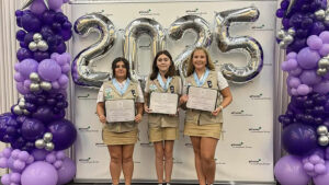 Tauni Greer, Taelynn Taylor and Riley Quinones, all members of Troop 51013, received the Girl Scout Silver Award.