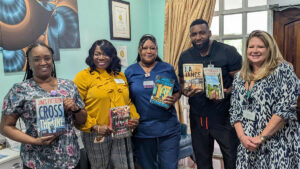 Library staff visited Vero Beach's Garden View Health and Rehab to deliver books to residents.