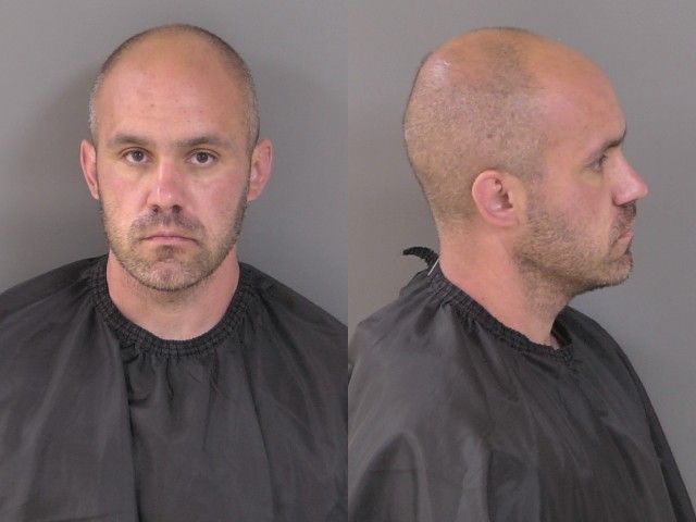 Man arrested after gunfire from backyard strikes youth camp in Vero Beach