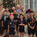 Cub Scouts from Pack 589 spread holiday cheer Thursday at Pelican Landing Assisted Living Facility in Sebastian.