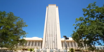 Florida lawmakers propose expanding the guardian program—allowing trained school staff to carry guns—to public colleges and universities following recent shootings at FSU and Brown University.