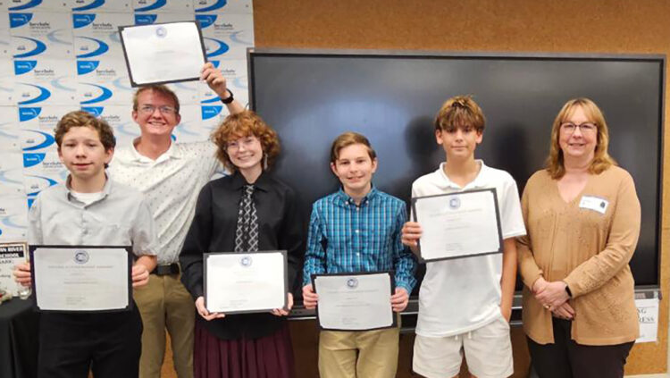 L-R: Jake Plate, Tyler Hendricksen, Gwinevere Hall, Thomas Hand, Blake Bruckner, and Youth Awards Chair Kim Prado