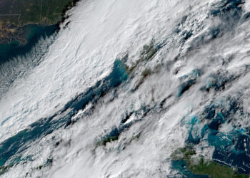 Sunday's flurries are due to a strong cold front colliding with moisture from the Gulf of Mexico (NOAA)