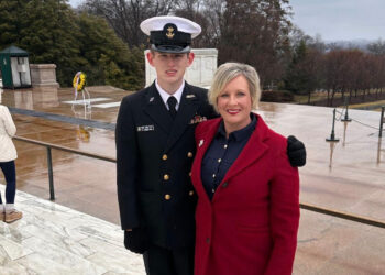 Cadet James Henry Adams Davey (L) stands with his mother, Susan Adams, at the Tomb of the Unknown Soldier