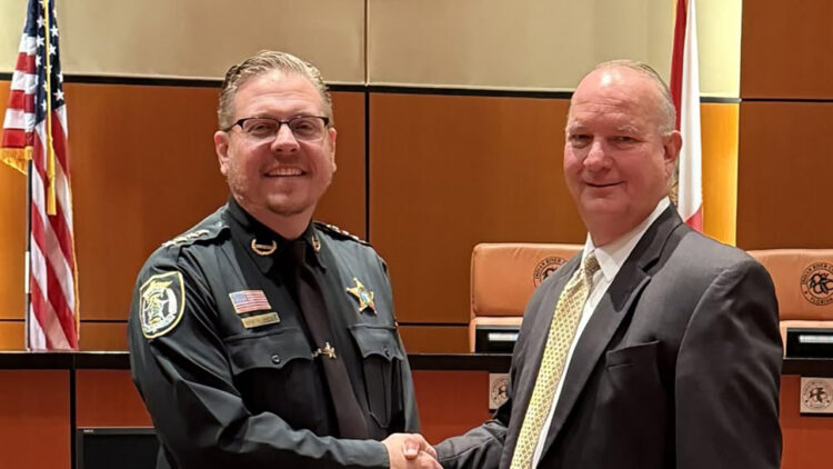 Sheriff Eric Flowers (left) and Board Chairman Deryl Loar (Indian River County)