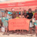 Orlando Health volunteers and members of Sober Surfers engaged with community members at the Orlando Health tent during the Longest Day, Longest Ride Surf Contest at Sebastian Inlet, hosted by the Sebastian Chamber of Commerce and held at Sebastian Inlet on Sunday, June 21. Orlando Health sponsored nine Sober Surfers participants in the contest, where surfer Brad Lee (pictured, fourth from left) won first place. Orlando Health team member Victor Rodriguez served as a judge, while additional team members distributed sunscreen and beach balls and raffled off a boombox and beach chairs. The family-friendly event raised funds and awareness for Alzheimer’s disease.
