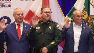 Indian River County Sheriff Eric Flowers (center)