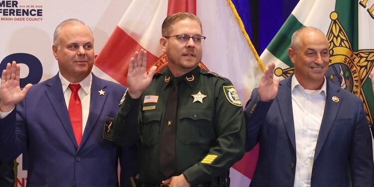 Indian River County Sheriff Eric Flowers (center)