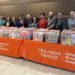 Hospital staff and Sebastian police officers sort and prepare 3,558 donated school supplies for local K-8 students